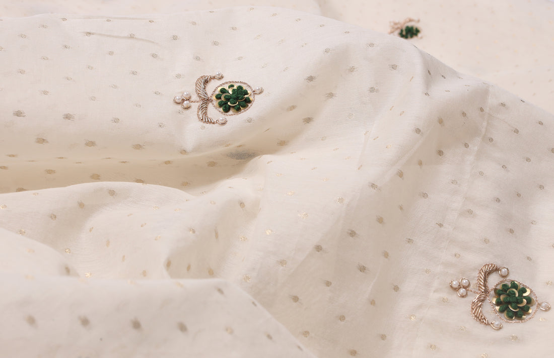 Off-White Cotton Saree with Gold Dots & Green Embellished Floral Motifs