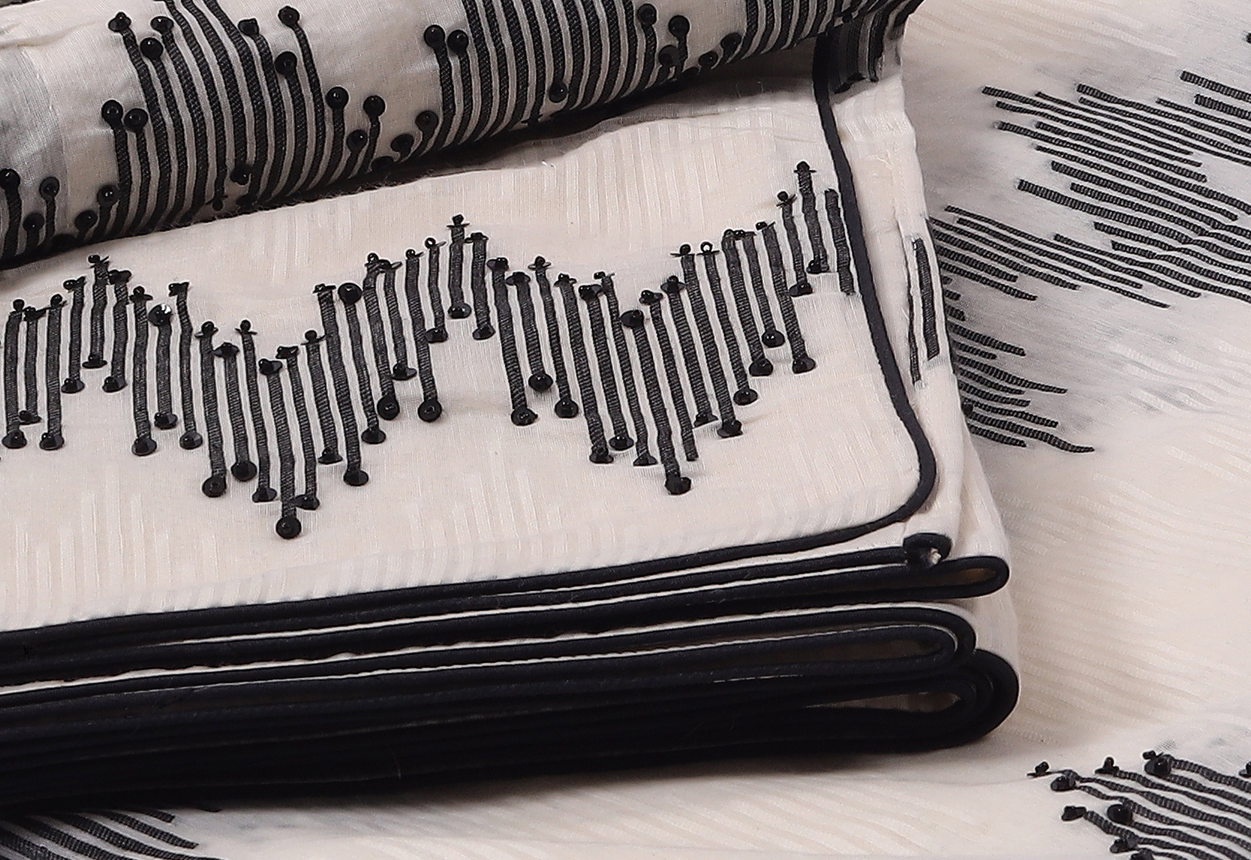 Off-White Cotton Saree with Black Thread Work & Beaded Abstract Design